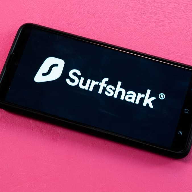 Surfshark logo on a phone